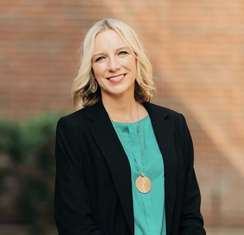 Portrait of Michelle Haag, Broker & Owner